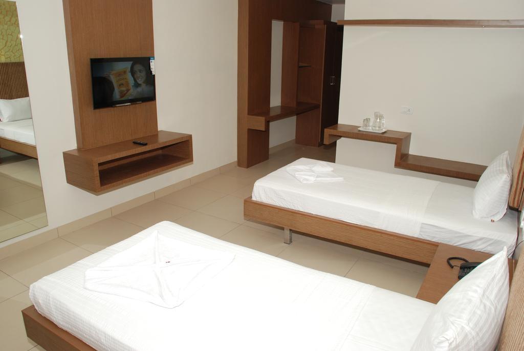 Hotel Pla Amrith Inn Tiruchirappalli Oda fotoğraf